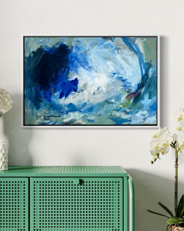 Messy Blue Small shown on living room over green desk